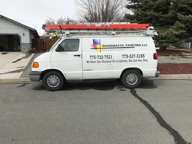 Goormastic Painting van parked outside a job